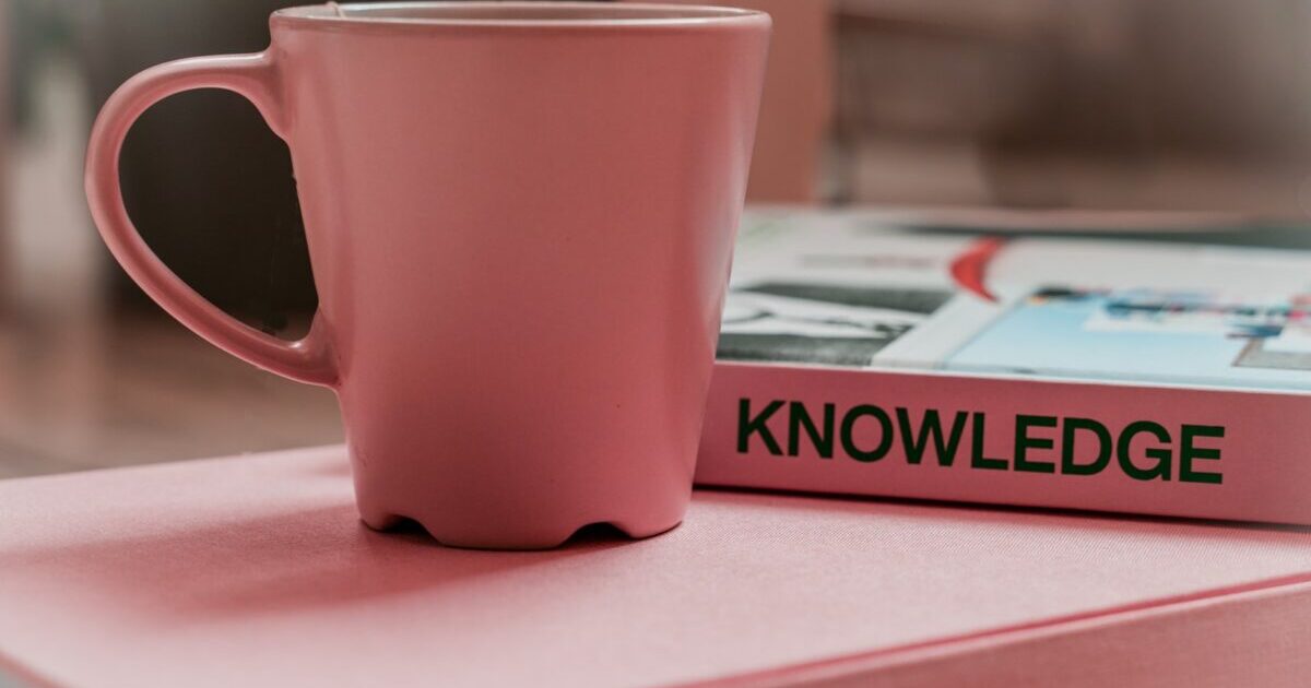 red and white nescafe ceramic mug