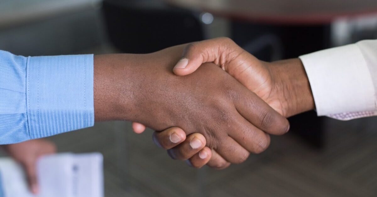 two person handshaking